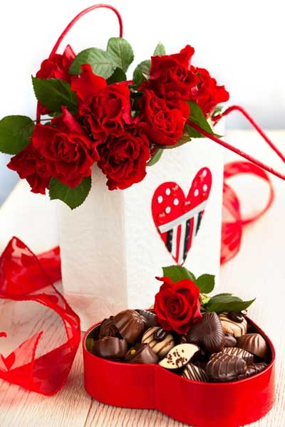 12 Red roses in Basket with Heart shaped chocolate box